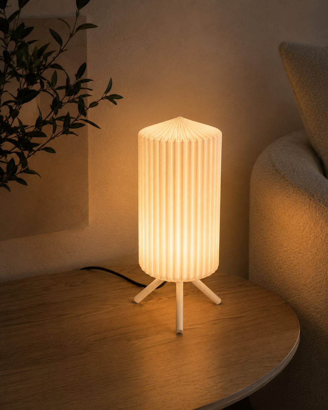 Lumhaus printed lamp glowing on a side table